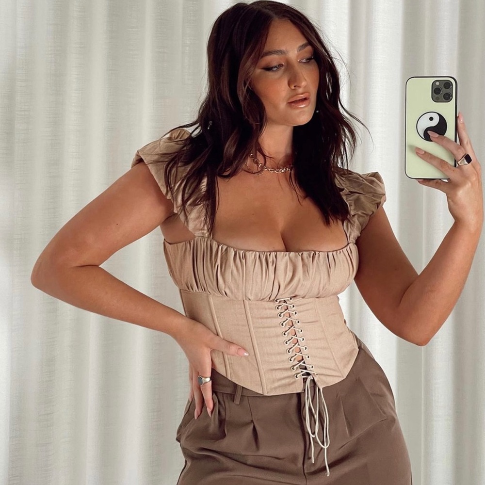 cute nude corset top that snatches you up!